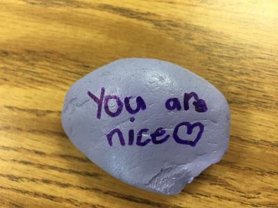 A rock with "You are nice" written on it